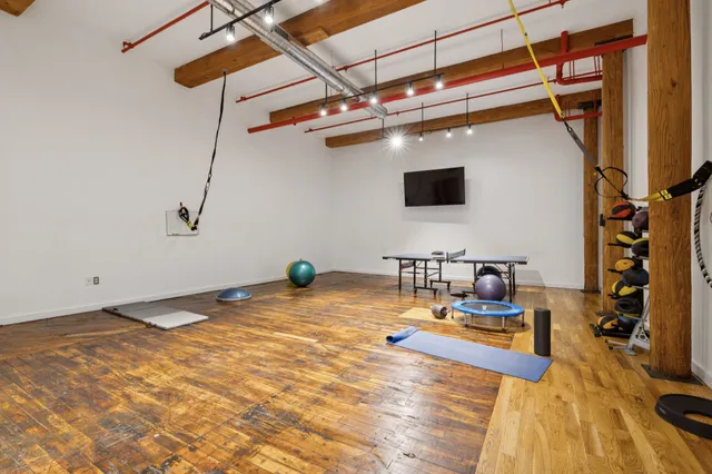 a view of a room with gym equipment