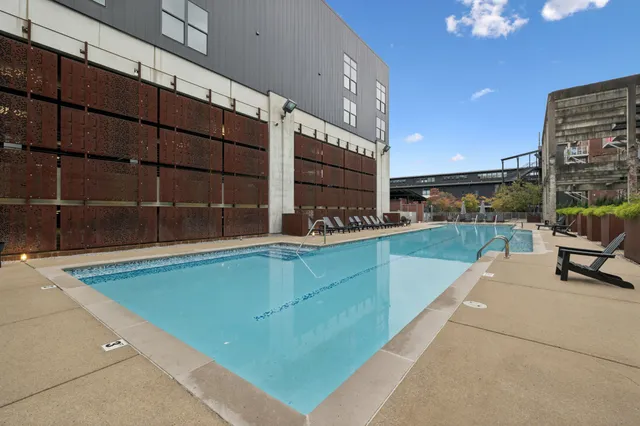 a view of a dining space with furniture window and outside view