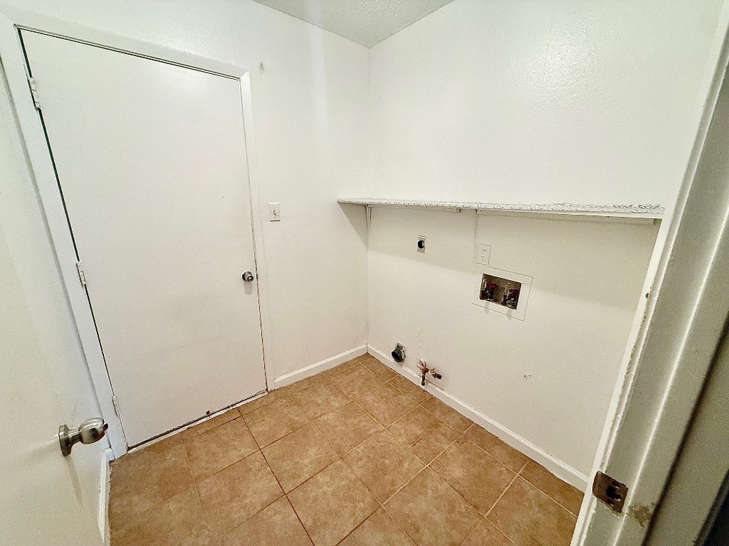12102 Grey Fawn Path Austin, TX 78750 - Photo 19 of 24 a view of a room with wooden floor