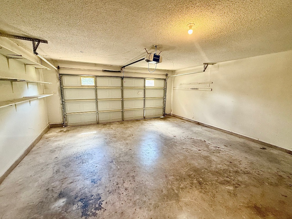 12102 Grey Fawn Path Austin, TX 78750 - Photo 21 of 24 a view of a garage