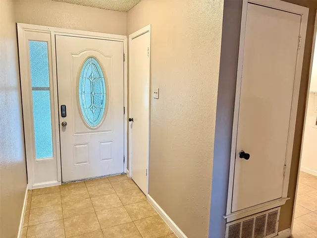 a view of a bathroom with washing machine