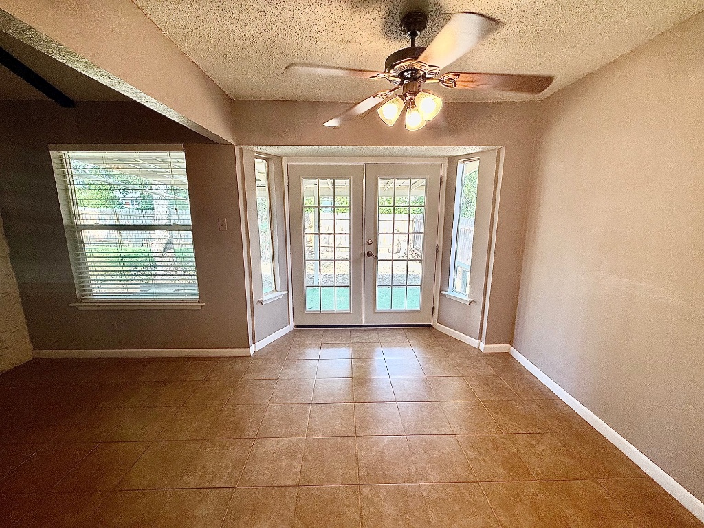 12102 Grey Fawn Path Austin, TX 78750 - Photo 8 of 24 a view of an empty room with a window