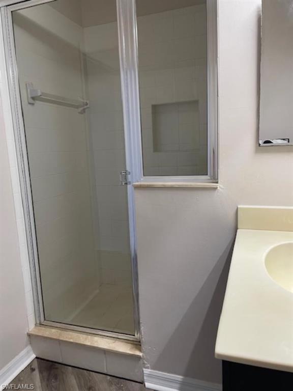 3610 Lansing Loop, Unit 103 Estero, FL 33928 - Photo 12 of 33 Guest Bath stall shower.