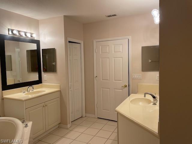 3610 Lansing Loop, Unit 103 Estero, FL 33928 - Photo 18 of 33 Master Bath with two vanities.