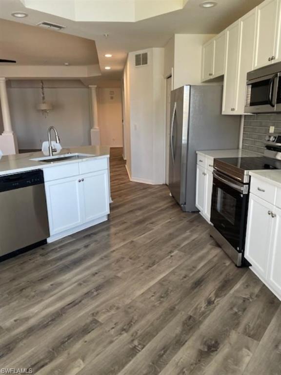 3610 Lansing Loop, Unit 103 Estero, FL 33928 - Photo 25 of 40 Recessed LED lighting and new stove.