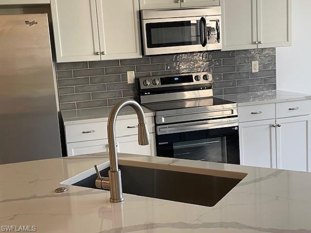 3610 Lansing Loop, Unit 103 Estero, FL 33928 - Photo 25 of 33 New Samsung stove