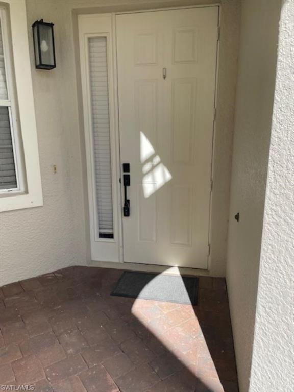 3610 Lansing Loop, Unit 103 Estero, FL 33928 - Photo 3 of 33 View of exterior entry