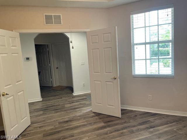 3610 Lansing Loop, Unit 103 Estero, FL 33928 - Photo 5 of 33 Large window and double door entry to den.