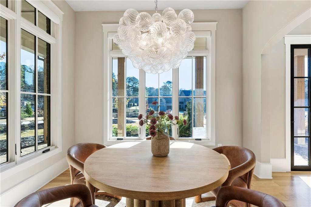1000 Haddie Way Alpharetta, GA 30004 - Photo 20 of 95 a dining room with furniture and window