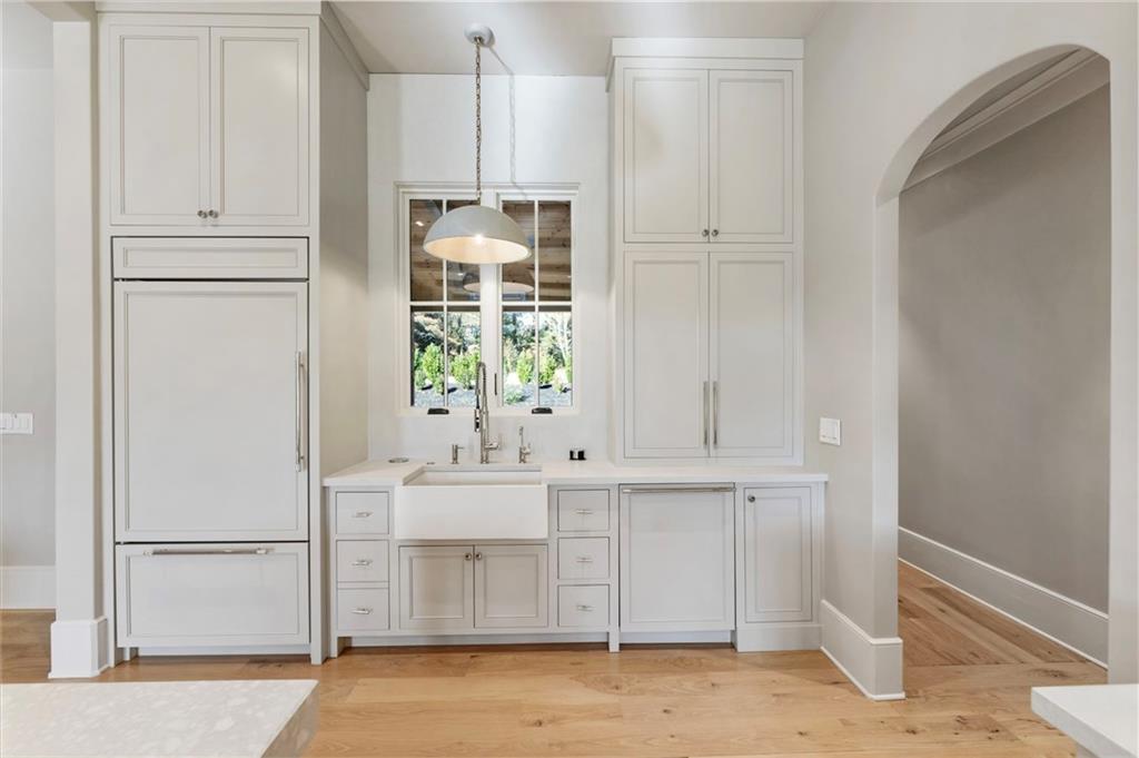 1000 Haddie Way Alpharetta, GA 30004 - Photo 23 of 95 a kitchen with white cabinets and window