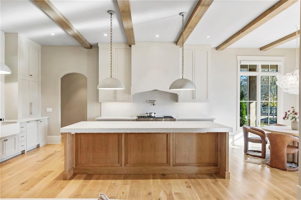1000 Haddie Way Alpharetta, GA 30004 - Photo 28 of 95 a spacious bathroom with a granite countertop sink mirror and a bath tub