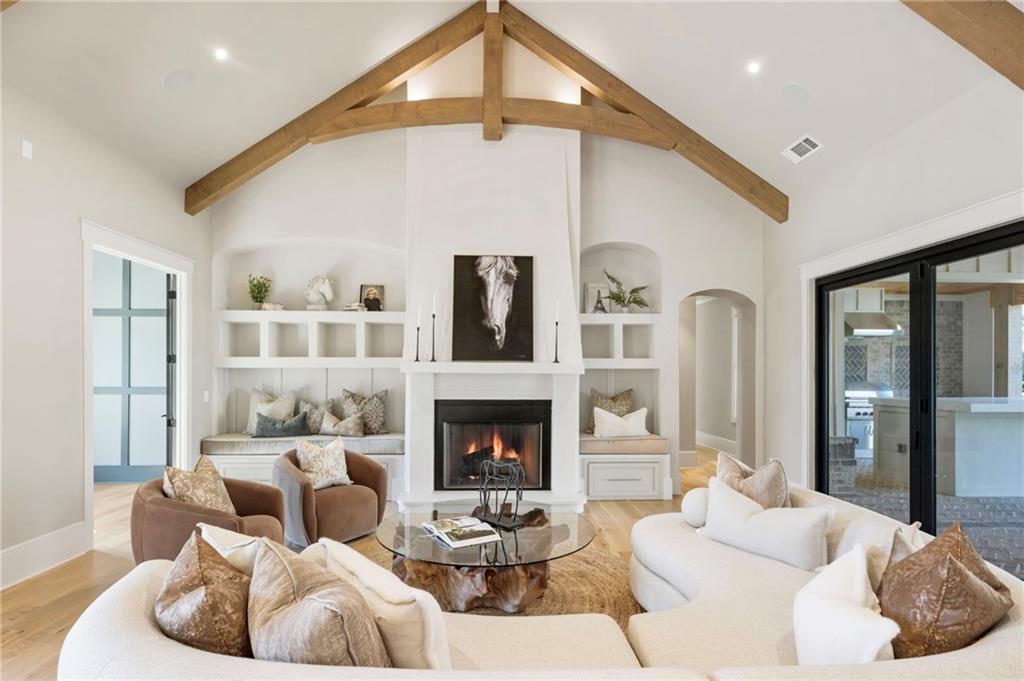 1000 Haddie Way Alpharetta, GA 30004 - Photo 33 of 95 a living room with furniture fireplace and a fireplace