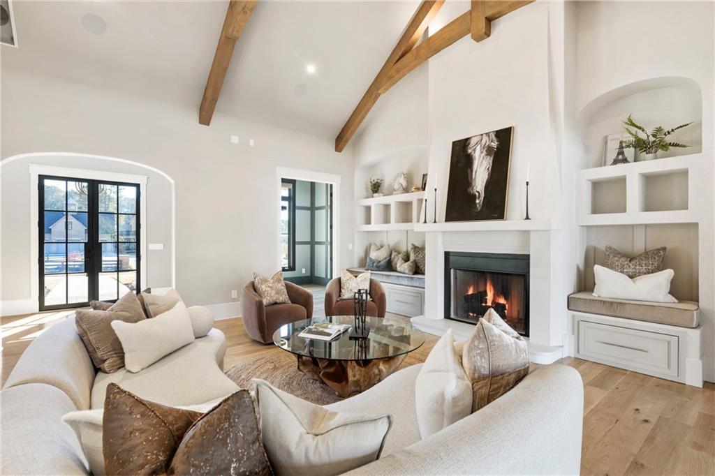 1000 Haddie Way Alpharetta, GA 30004 - Photo 34 of 95 a living room with furniture and a fireplace