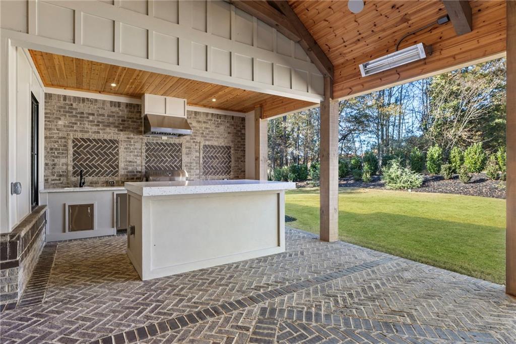 1000 Haddie Way Alpharetta, GA 30004 - Photo 46 of 95 a view of a porch with a floor to ceiling window next to a yard