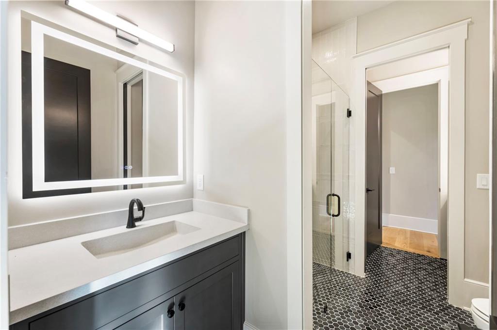 1000 Haddie Way Alpharetta, GA 30004 - Photo 70 of 95 a bathroom with a sink and a mirror