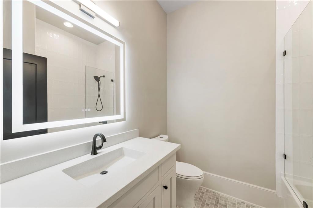 1000 Haddie Way Alpharetta, GA 30004 - Photo 79 of 95 a bathroom with a sink and a toilet