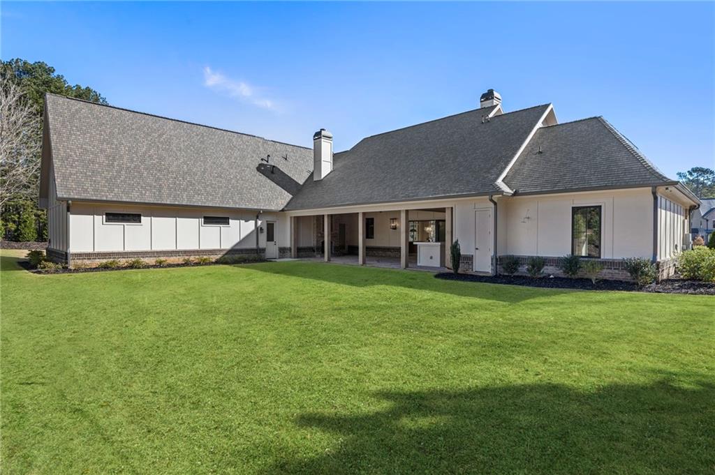 1000 Haddie Way Alpharetta, GA 30004 - Photo 80 of 95 a front view of a house with a garden