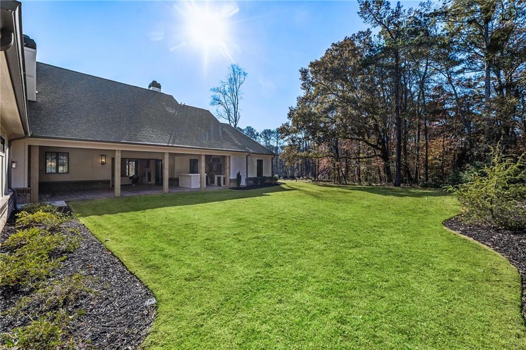 1000 Haddie Way Alpharetta, GA 30004 - Photo 81 of 95 front view of a house with a yard