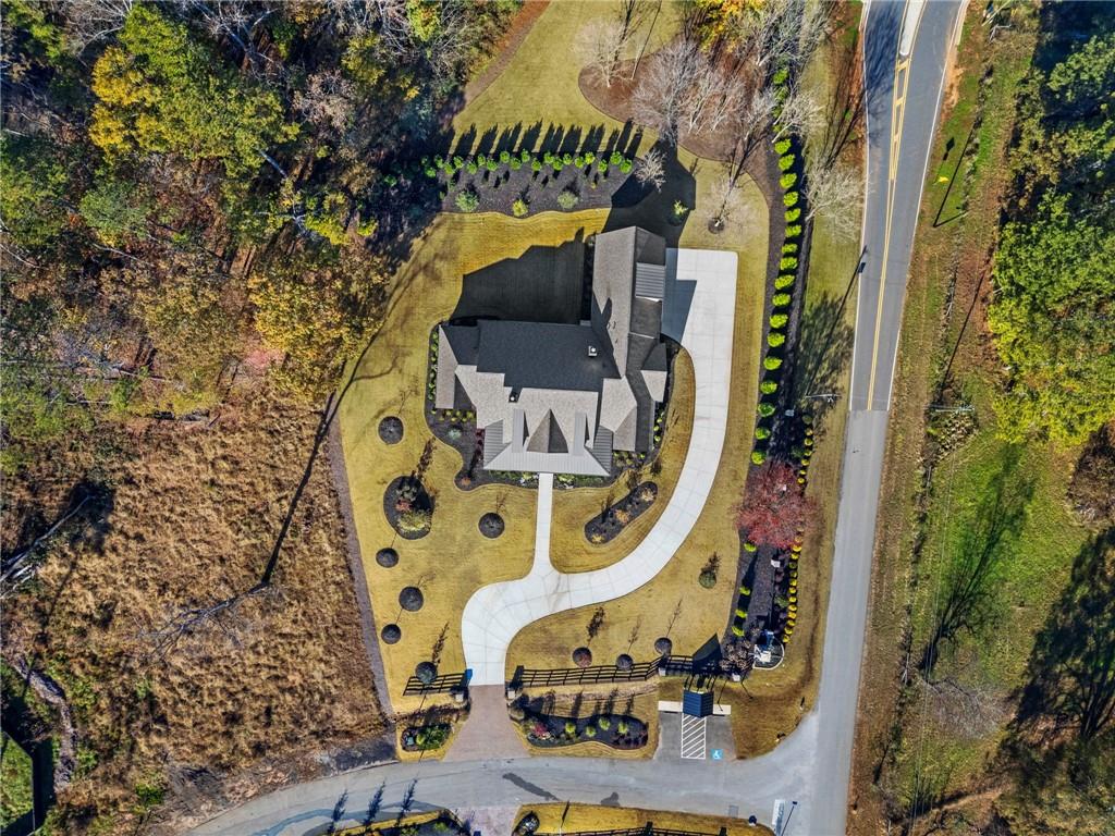 1000 Haddie Way Alpharetta, GA 30004 - Photo 85 of 95 an aerial view of a swimming pool with outdoor seating and yard