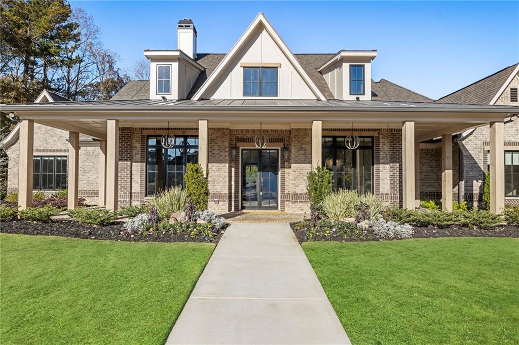1000 Haddie Way Alpharetta, GA 30004 - Photo 9 of 95 front view of a house with a yard