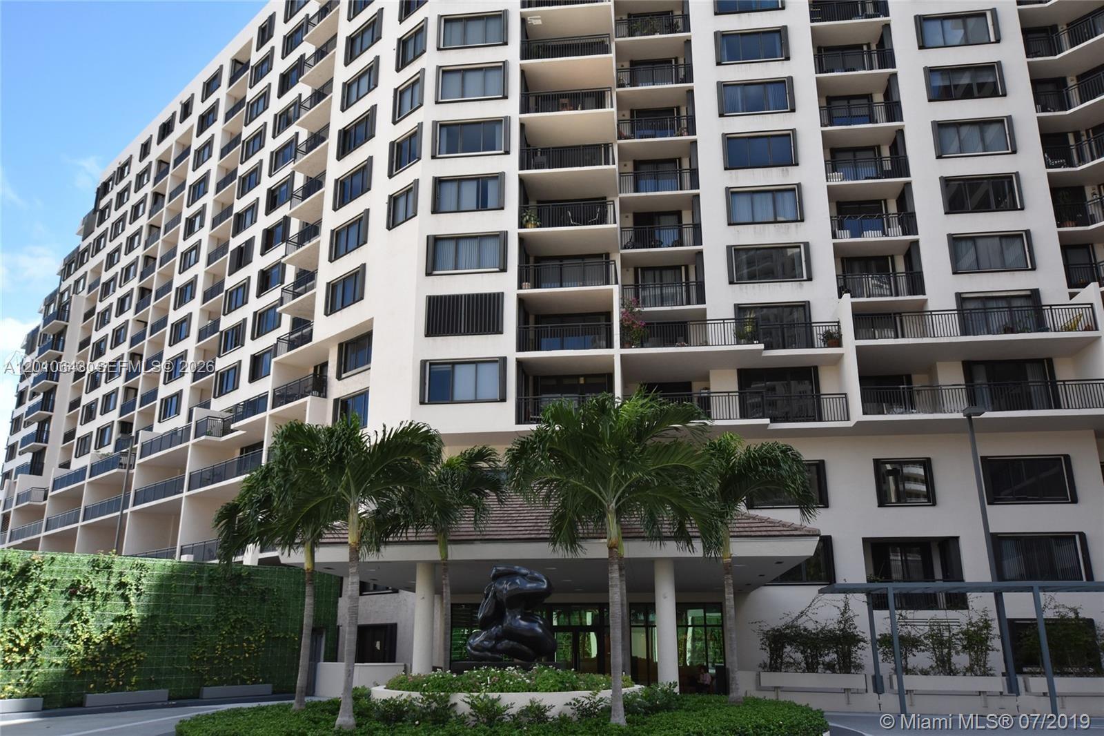 540 Brickell Key Drive, Unit PH1812 Miami, FL 33131 - Photo 14 of 29 a front view of a multi story building
