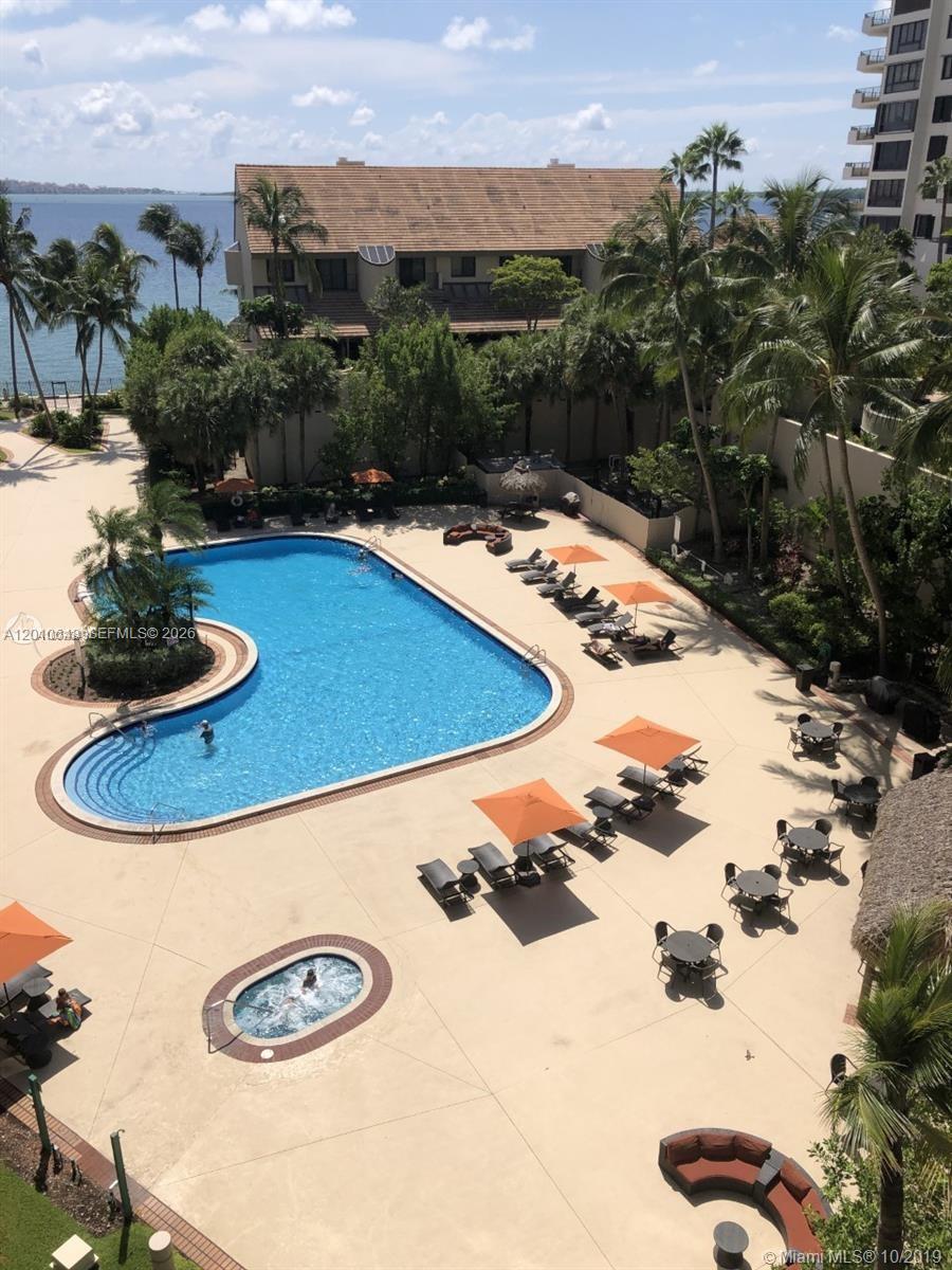 540 Brickell Key Drive, Unit PH1812 Miami, FL 33131 - Photo 18 of 29 a view of a swimming pool with a yard