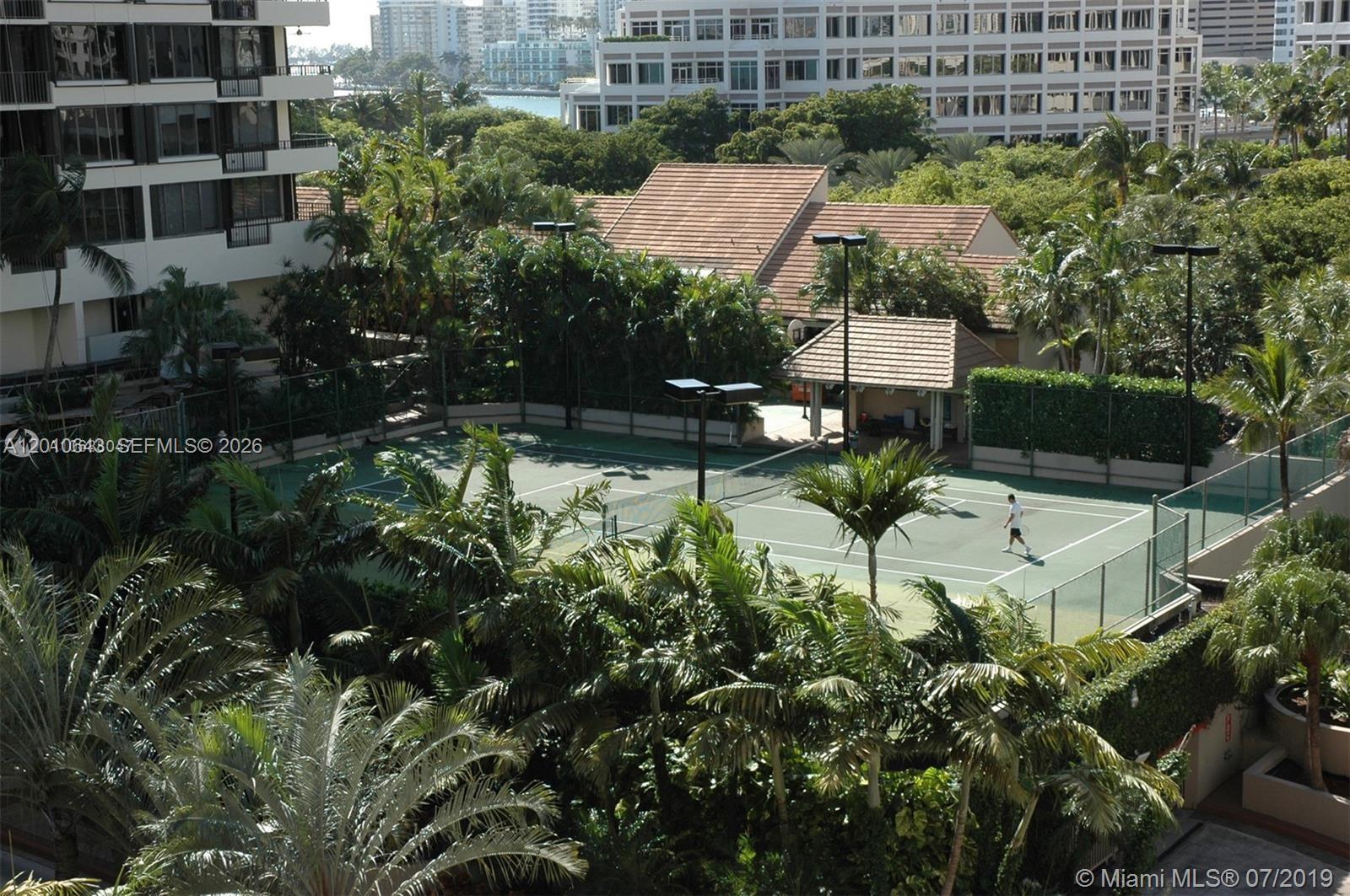 540 Brickell Key Drive, Unit PH1812 Miami, FL 33131 - Photo 22 of 29 a view of a swimming pool with a patio