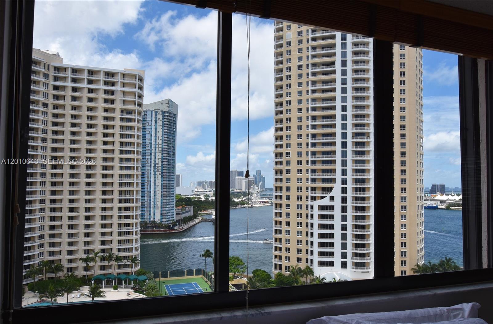 540 Brickell Key Drive, Unit PH1812 Miami, FL 33131 - Photo 9 of 29 a front view of a building with a yard