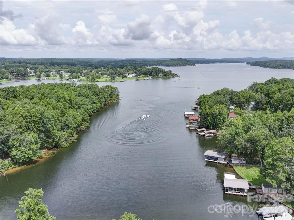Lot 9 Emerald Shores Rd Mount Mount Gilead, NC 27306 - Photo 1 of 3 a view of a lake with a city