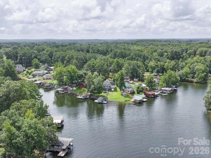 Lot 9 Emerald Shores Rd Mount Mount Gilead, NC 27306 - Photo 2 of 3 a view of a lake with houses