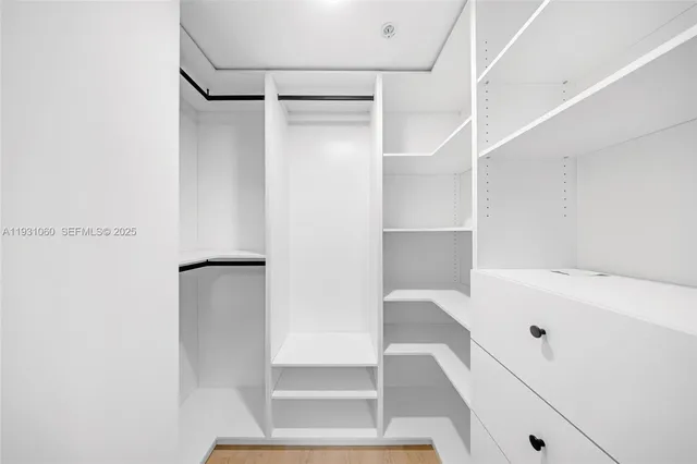 a view of a living room and hardwood floor