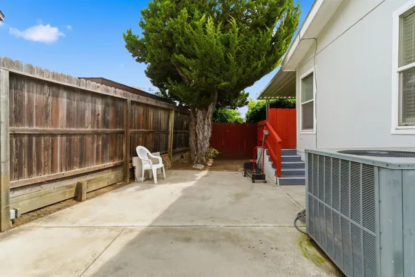 a view of a house with a street