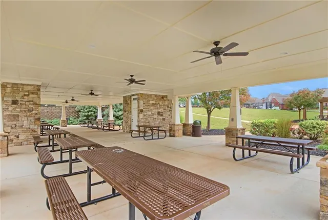 an aerial view of a house with swimming pool
