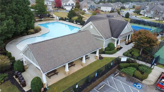 an aerial view of a house with a garden