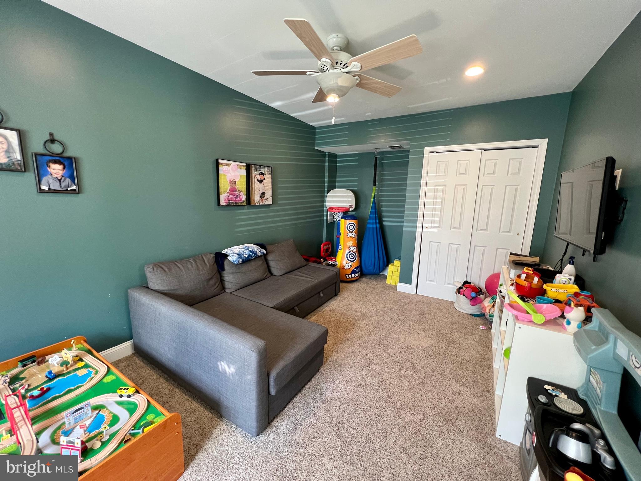 6256 Madison Court Bensalem, PA 19020 - Photo 6 of 14 a living room with furniture and a flat screen tv