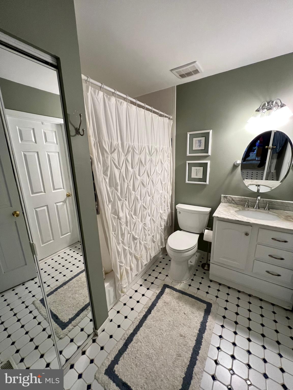 6256 Madison Court Bensalem, PA 19020 - Photo 7 of 14 a bathroom with a sink toilet and shower