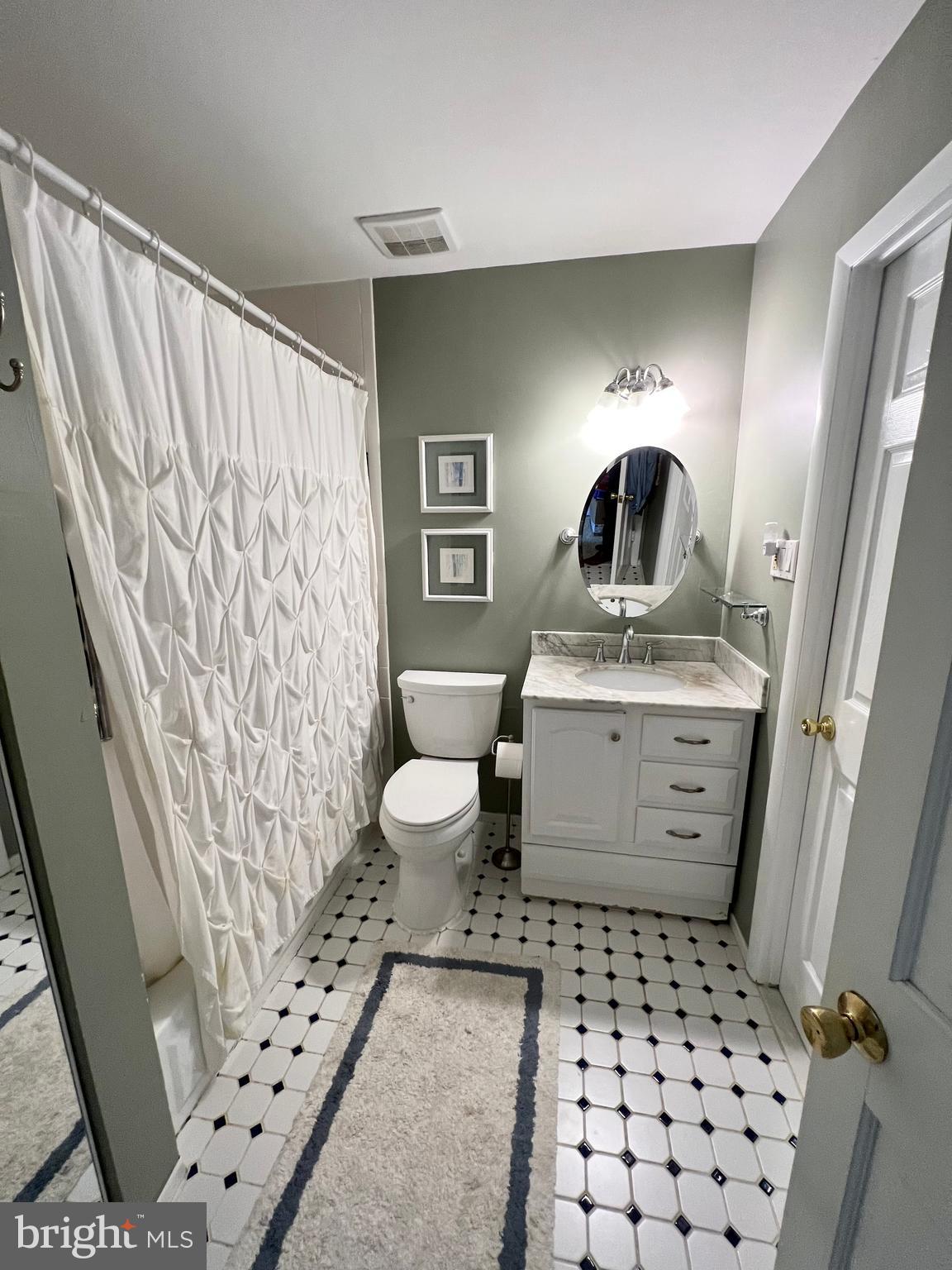 6256 Madison Court Bensalem, PA 19020 - Photo 8 of 14 a bathroom with a sink toilet and shower