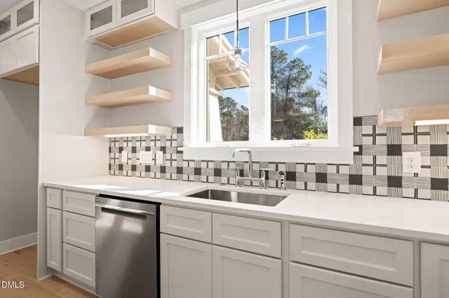 a view of kitchen and front door