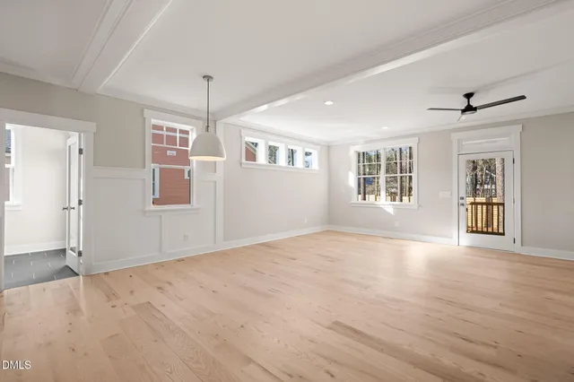 a view of a hallway with entryway door