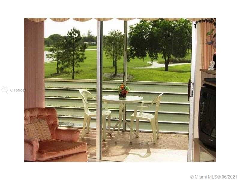 Arrowhead Davie, FL 33324 - Photo 11 of 21 a view of a porch and a yard