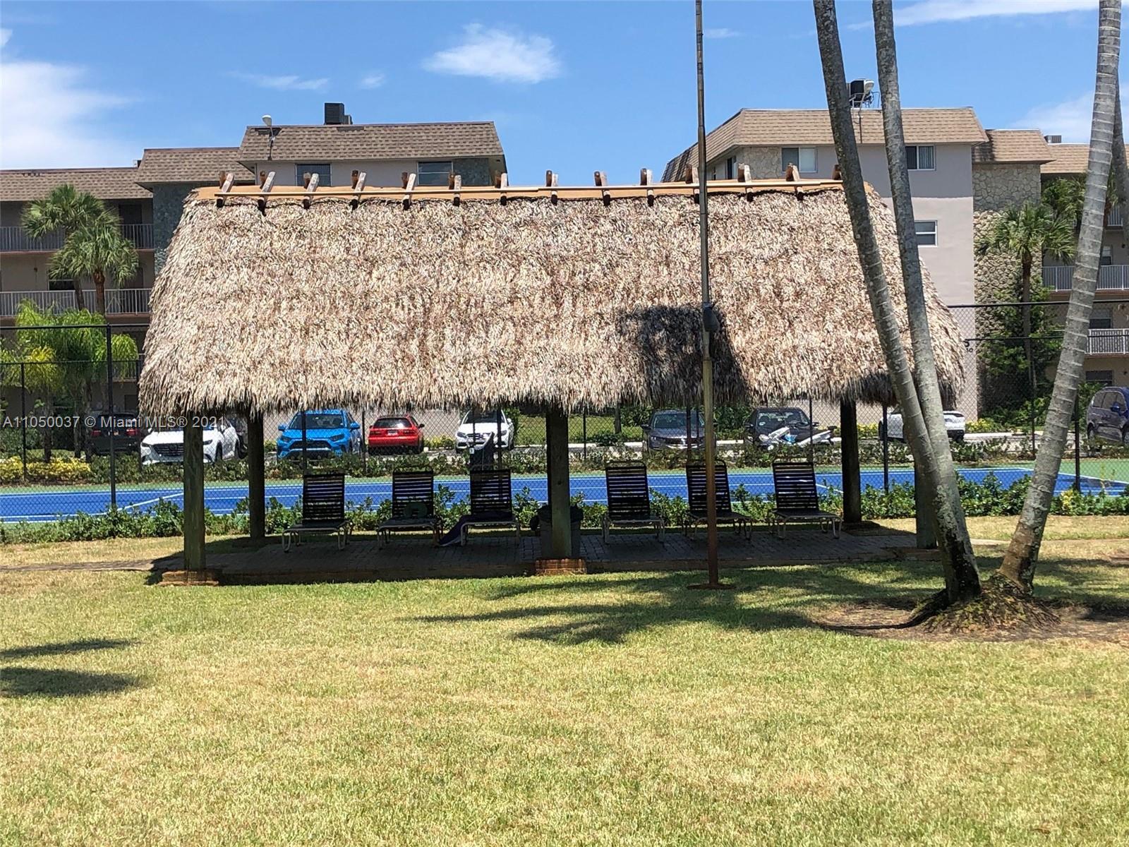 Arrowhead Davie, FL 33324 - Photo 14 of 21 a building view with swimming pool