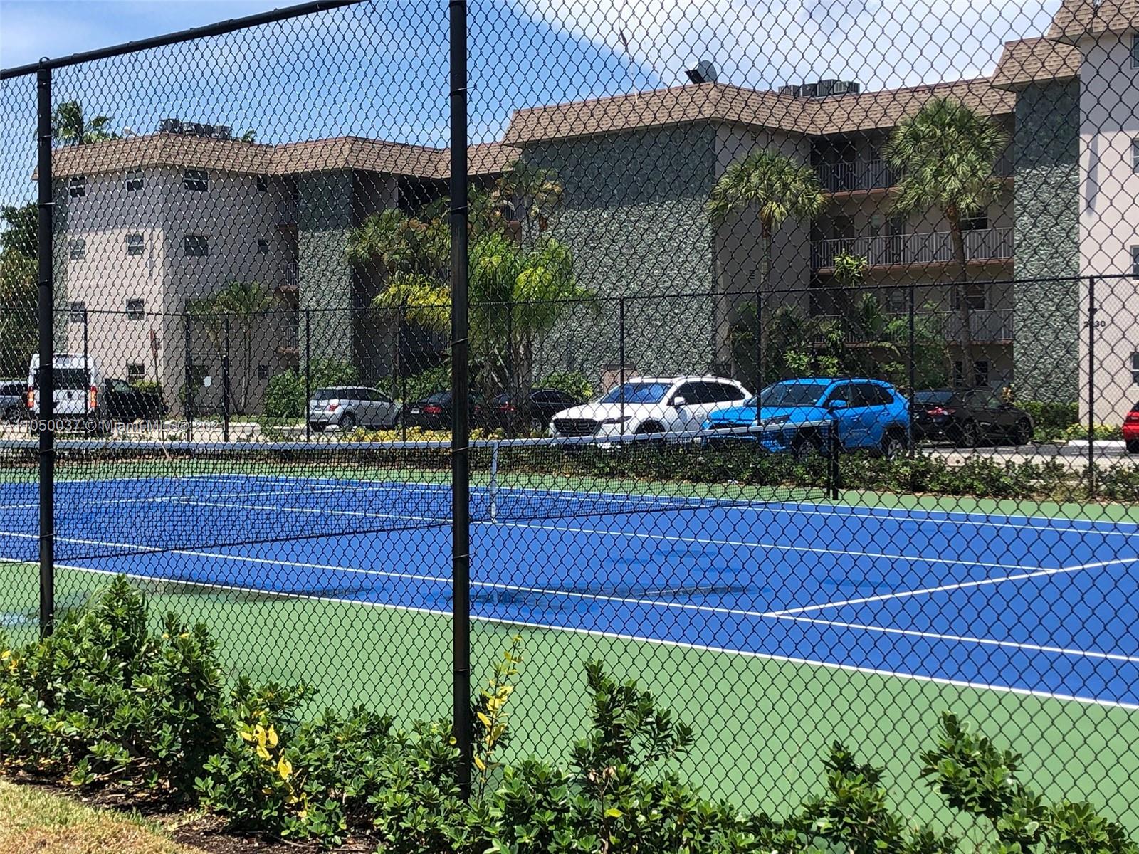 Arrowhead Davie, FL 33324 - Photo 16 of 21 a front view of a house with a garden