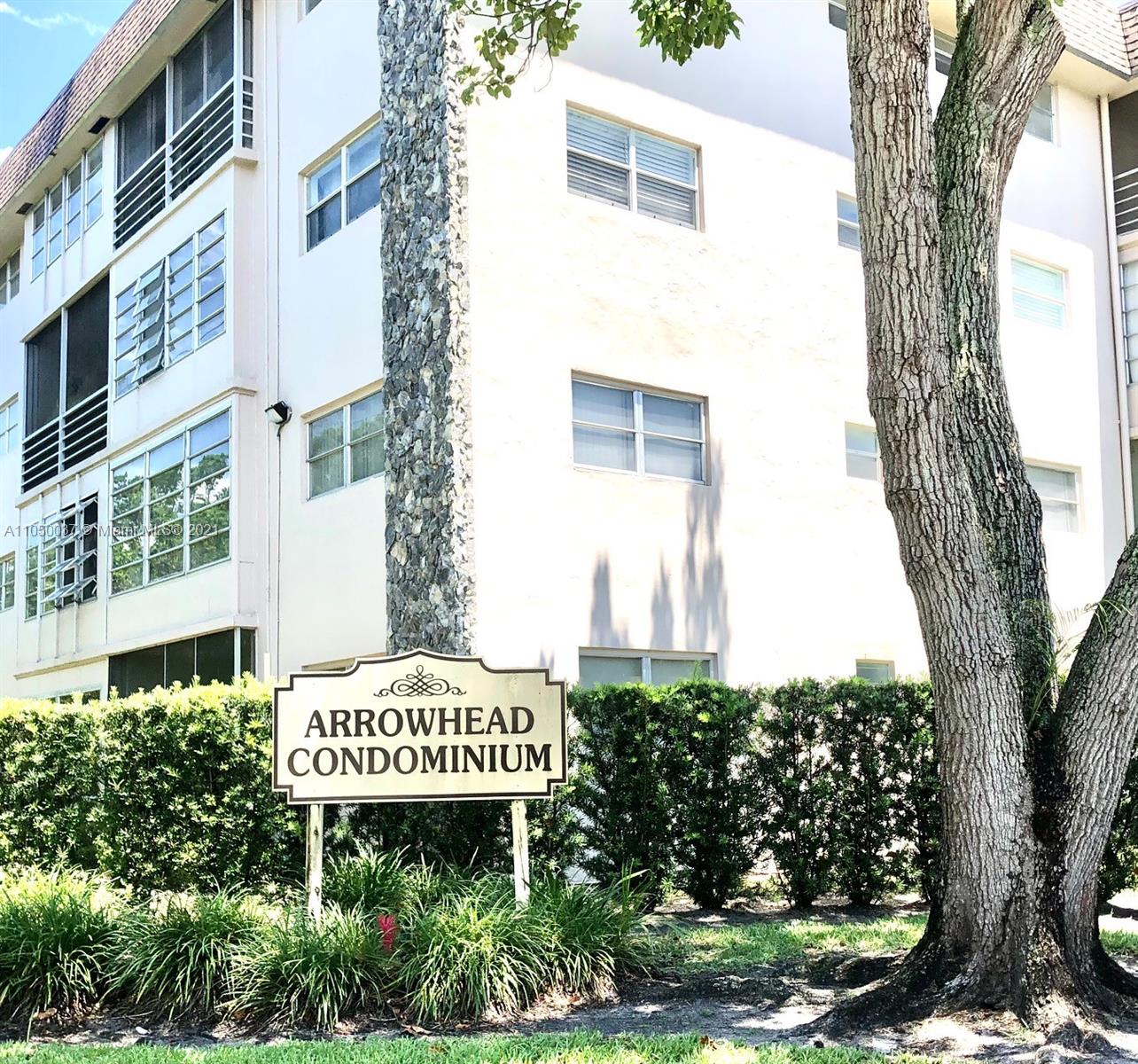 Arrowhead Davie, FL 33324 - Photo 17 of 21 a sign that is sitting on a brick wall