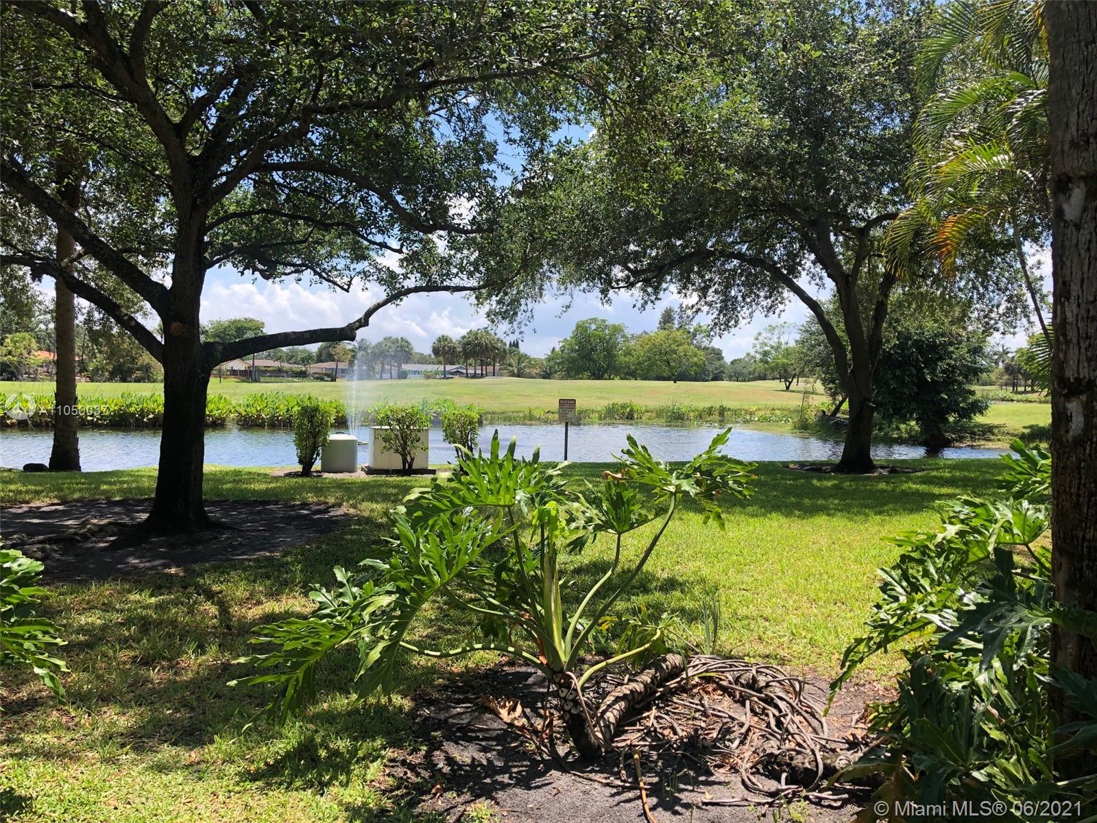 Arrowhead Davie, FL 33324 - Photo 21 of 21 a view of a lake with a large trees