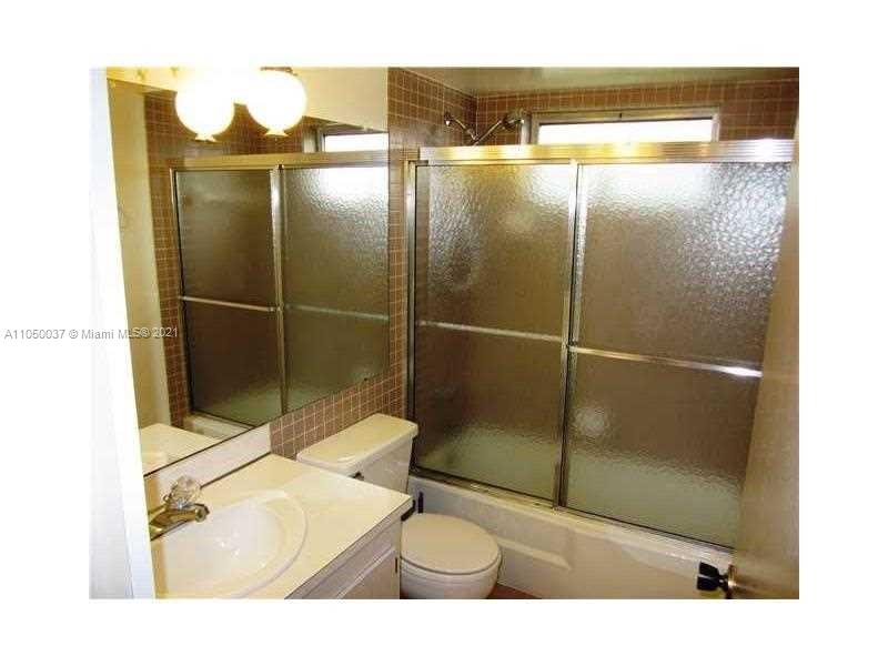 Arrowhead Davie, FL 33324 - Photo 8 of 21 a bathroom with a sink toilet and shower