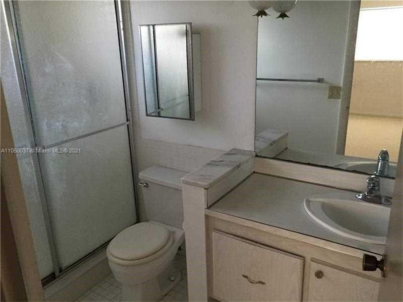 Arrowhead Davie, FL 33324 - Photo 10 of 21 a bathroom with a sink toilet and shower