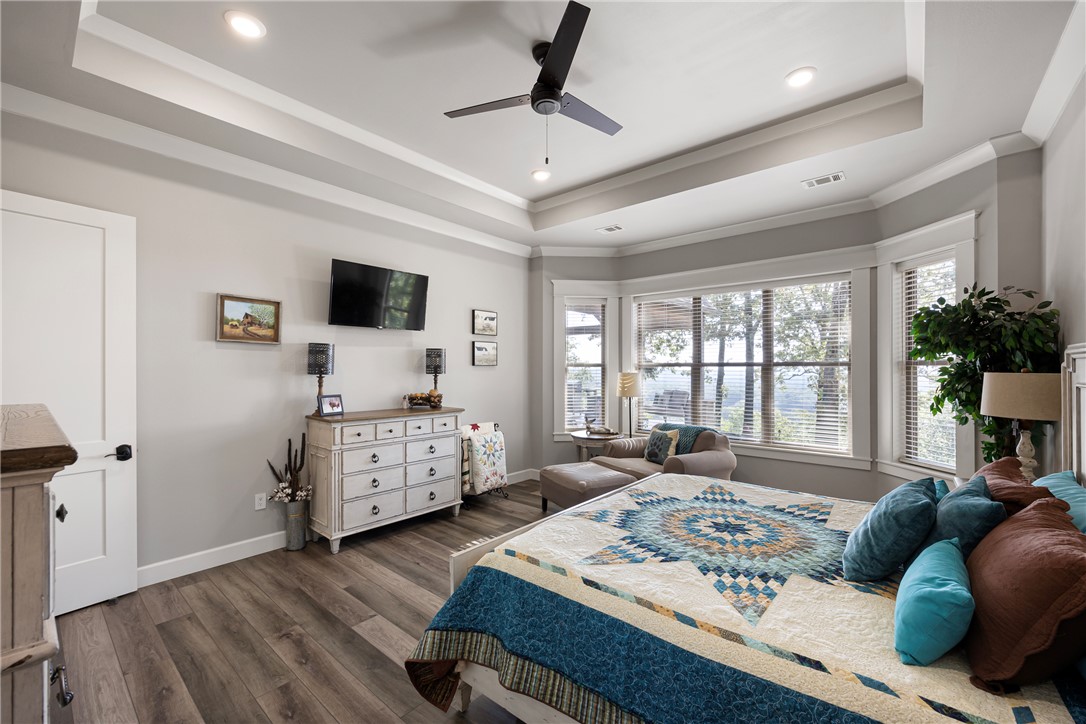 3419 Bailey Loop Road London, AR 72847 - Photo 22 of 60 Tray ceiling with recessed lighting and ceiling fan