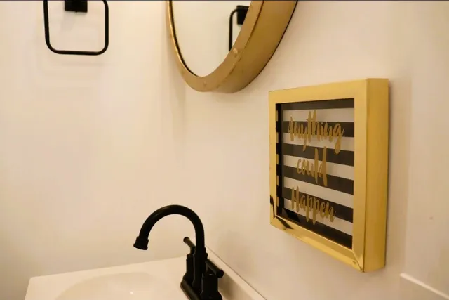 a view of a patio with table and chairs with wooden floor