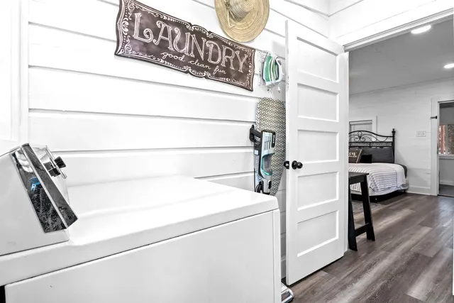 a view of a lake with houses in the back