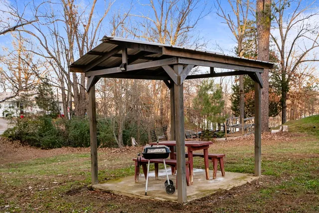 a view of a porch with furniture and yard